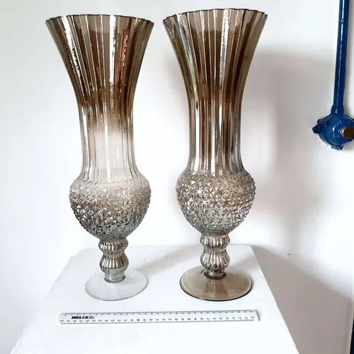 Pair of tall clear and brown glass vases (1 slightly more clear)
