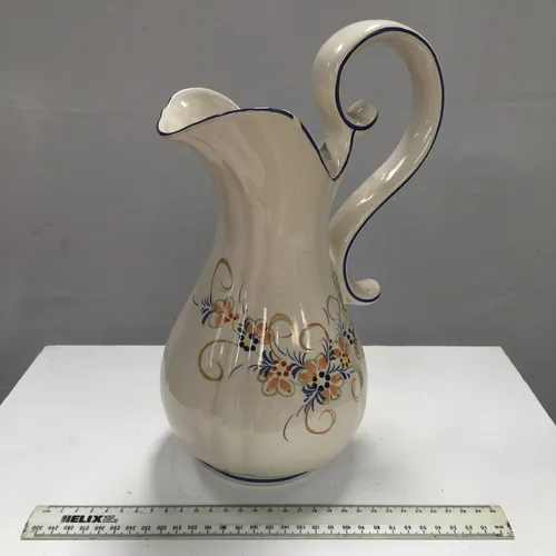 Tall Cream Jug with Large Curved Handle and Hand Painted Floral Decoration