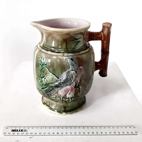 Glazed Ceramic Brown Mejolica jug with bird design 