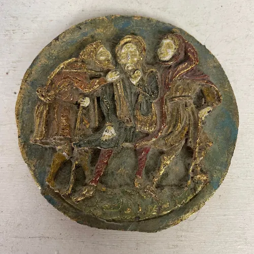 Small Circular Pottery Piece with Three Figures 
