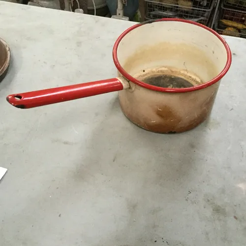 Cream Enamelware Pan with red rim and handle 