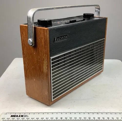 Period Hacker Hunter radio with vinyl and wood panels