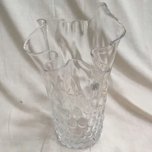 Clear glass divot vase with handkerchief fold edge