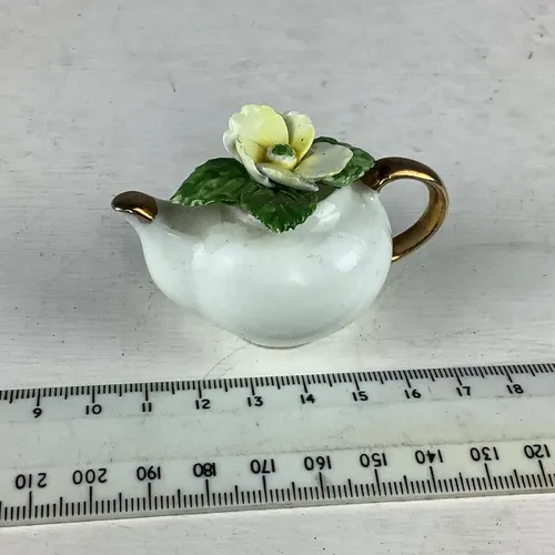 Small Ceramic Teapot with Planted Flowers