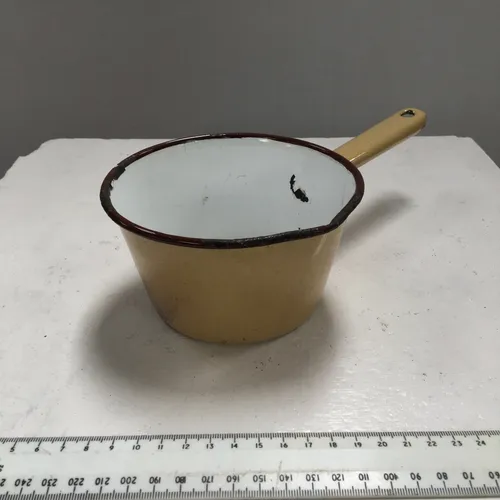 Small yellow enamel cooking pot pan