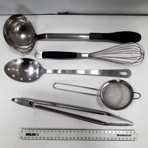 Assortment of modern metal kitchen utensils