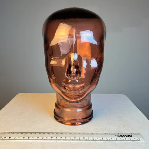 Translucent orange glass bust