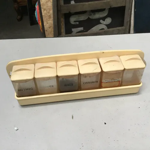 Cream plastic spice rack with individual space pots (6)