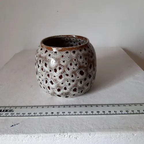 Small ceramic pot with brown and white speckled design