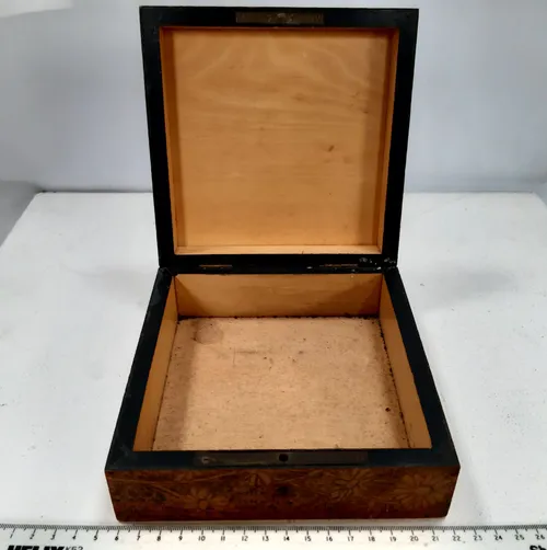 Square wooden box with embossed flower design