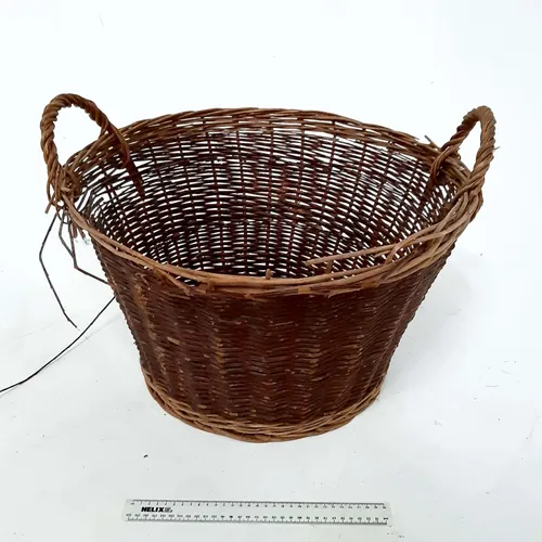 Large dark wicker woven basket with handles