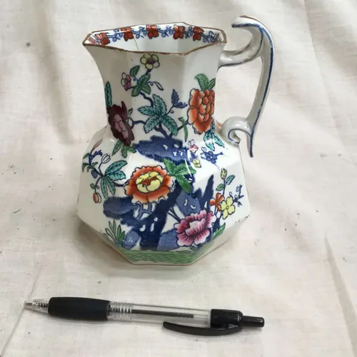 White octagonal jug with floral detail
