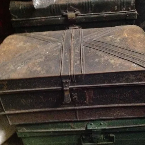 Period metal trunk with hinged lid and Union Jack trim on lid