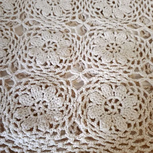 Selection of small doily placemats and table decorations