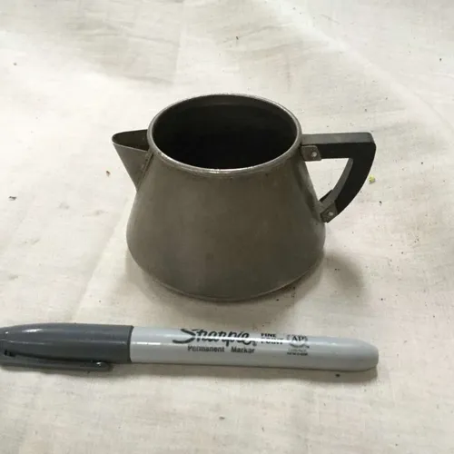 Short pewter jug with wood handle