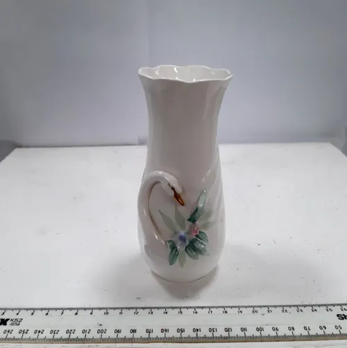 Small china vase with swan and leaf design