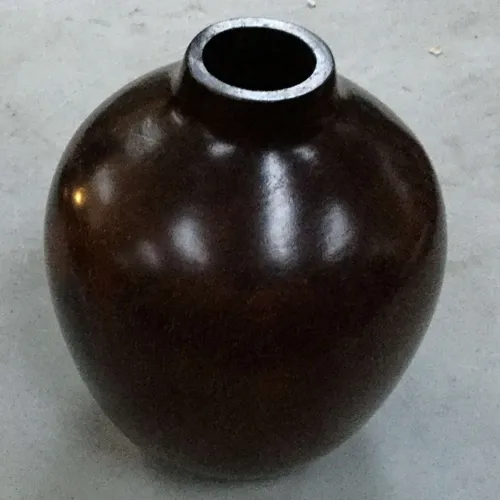 Polished wooden vase