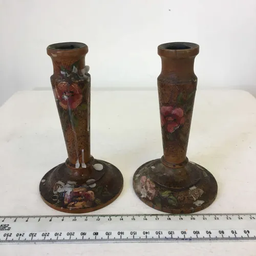 Pair of small varnished wood candlesticks with hand painted rose design