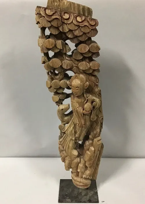 antique wood carving asian fairy tale  gable from archway 