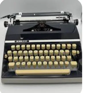 Vintage Adler Typewriter black creme keys