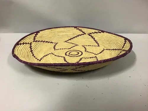 flat woven basket  burgundy design african (wall art)