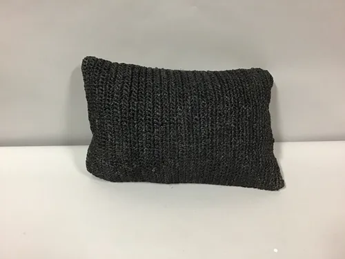 black raffia lumbar pillow