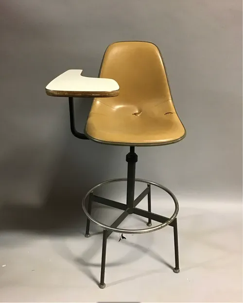 eames yellow adjustable stool with school desk/drafting 