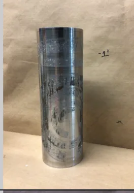 etched metal cylinder vase