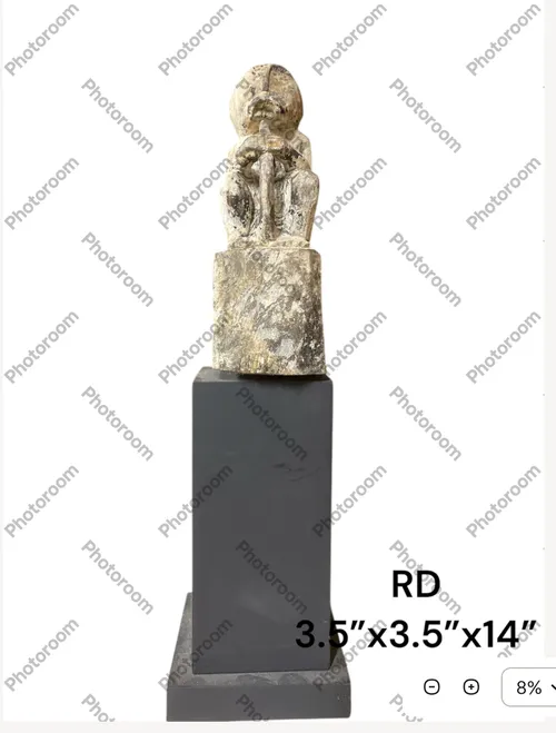 white sculpture abstract man white on dark base crying man sitting 