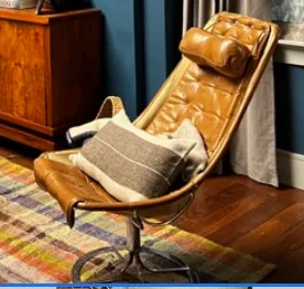 swedish swivel bucket lounge chair brown leather BRUNO MATHSSON