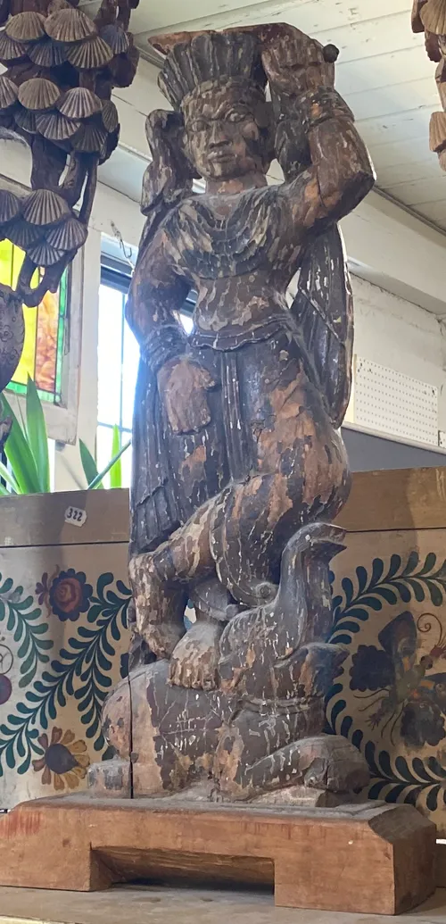 hand carved asian native man on elephant 