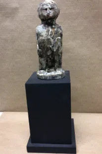 tribal man sculpture ceramic on black base