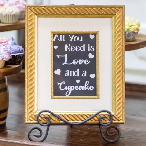 Sign All you need is Love and a Cupcake