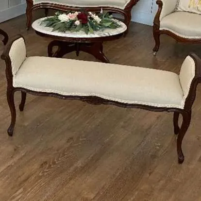 Antique Bench upholstered in a beautiful neutral oatmeal color upholstery!