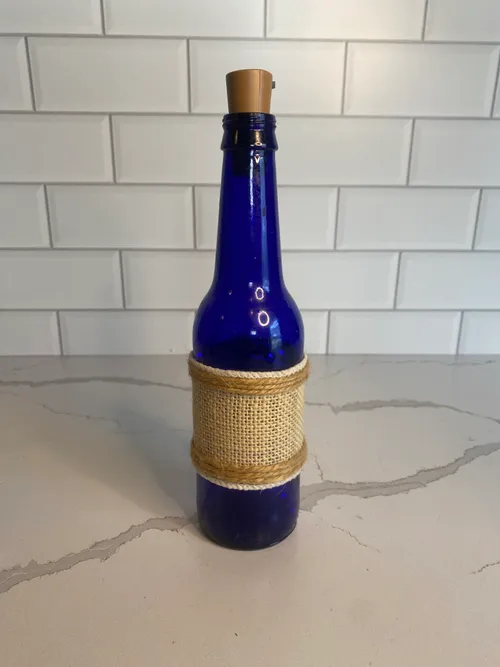 Assorted Blue Wrapped Lighted Bottles