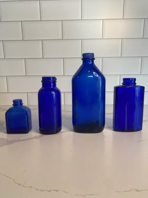 Assorted Cobalt Blue Bottles