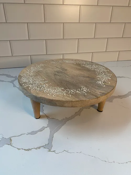 Round Wood Riser with Floral Detail