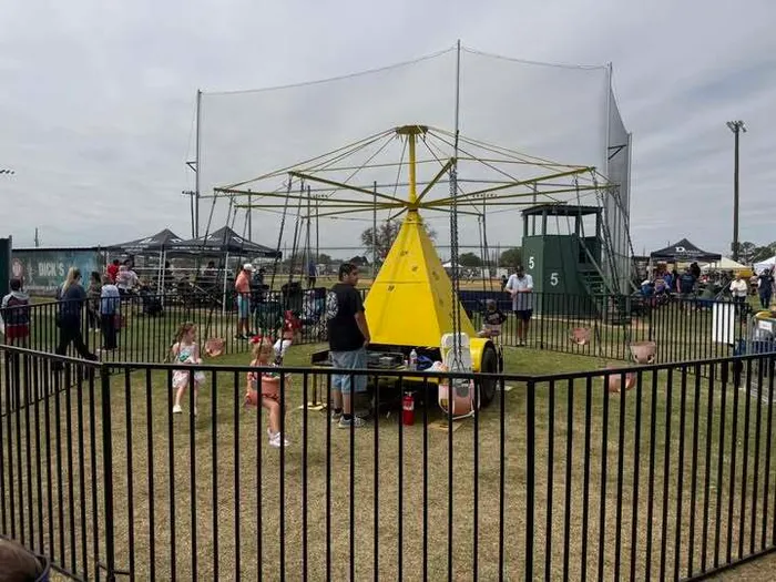 Rent carnival rides for School Events and School Carnivals in Houston Texas from Dino Jump USA.