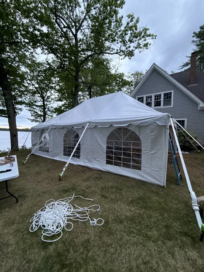 20x30 pole tent with sidewalls in Manchester, Maine on the lake.