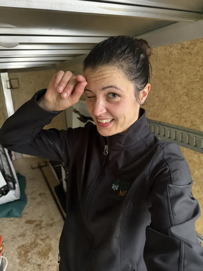 Becca, the owner of Event Rent ME is soaked after a rainy install!