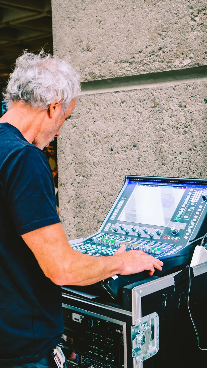 Sound engineer dries mixer