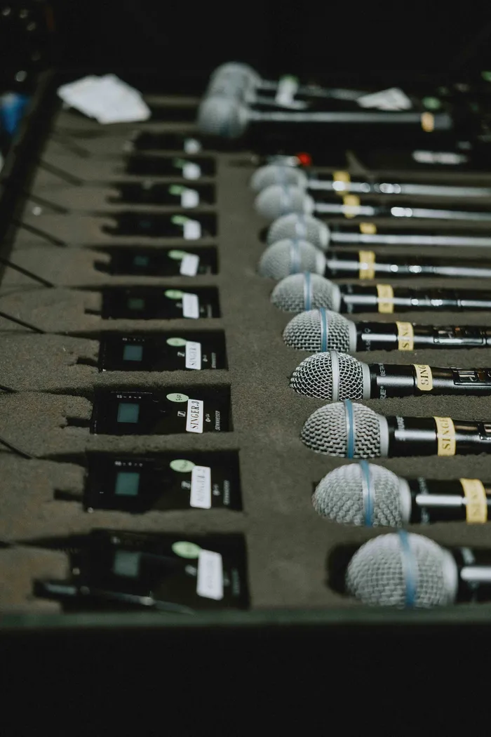 Multiple microphones used for a conference panel discussion and audience Q&A