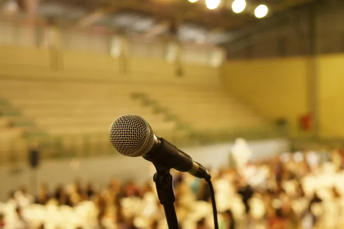 A professional PA speaker package and microphone setup deployed for a corporate business seminar in Unley.