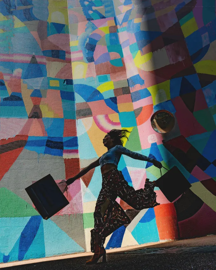 lady swinging shopping bag