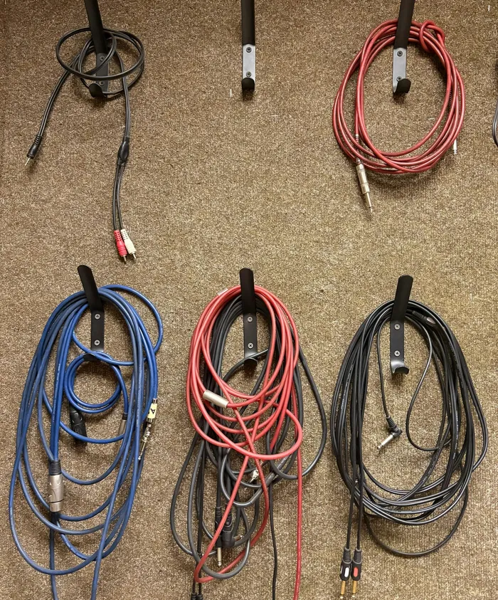 Professional audio cables organised and ready for a live event PA system.