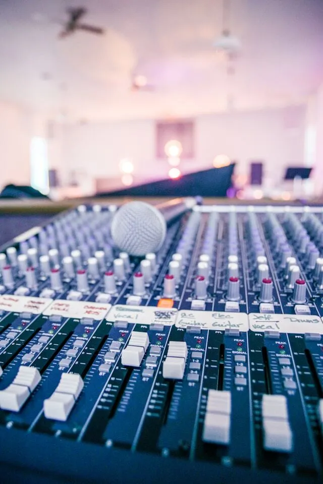 Mixing desk and microphone. Audio Hire Adelaide.