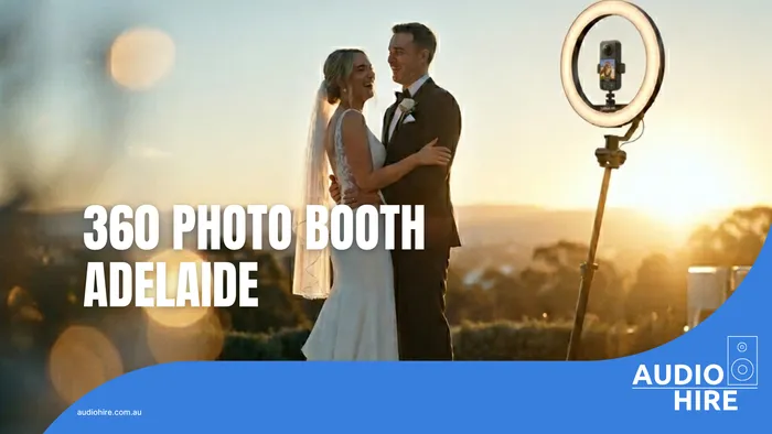 Guests enjoying the 360 photo booth experience with a black carpet and stanchions at an Adelaide venue.